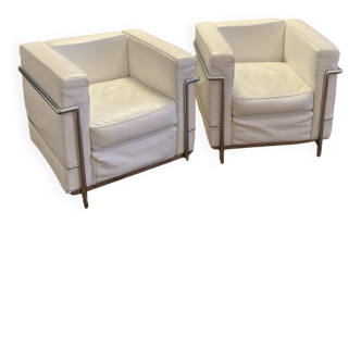 Pair of white leather and chrome armchairs