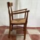 Light wood armchair seated in vintage straw dimension: height -78cm- width -54cm-