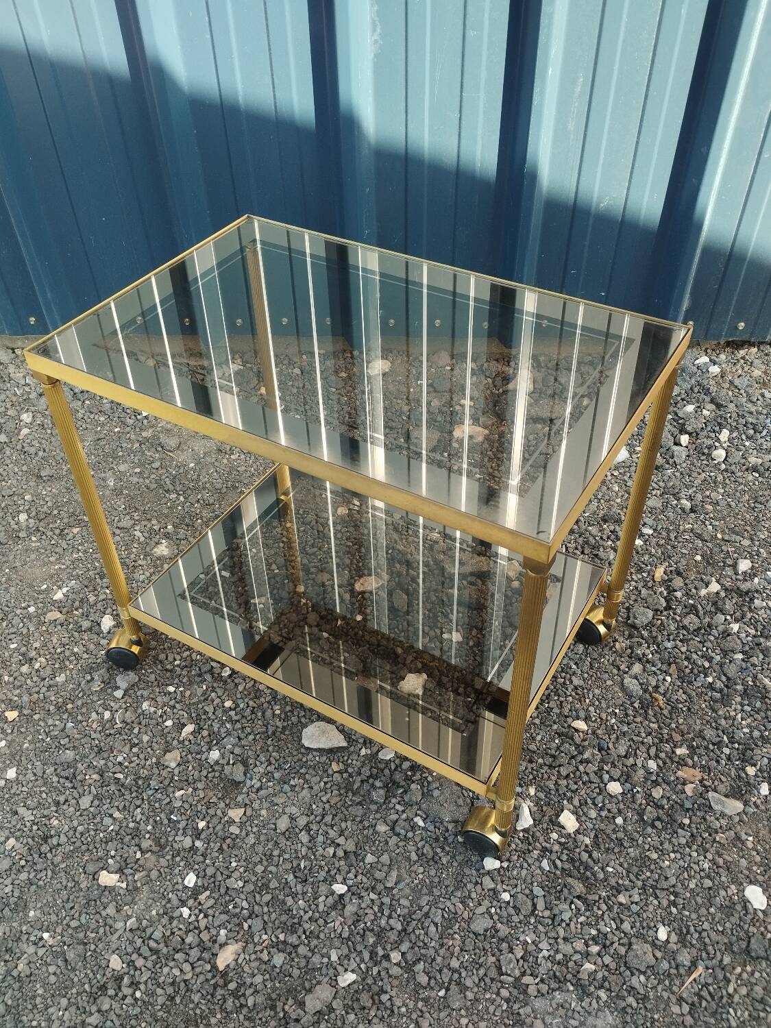 Vintage golden metal rolling dessert trolley