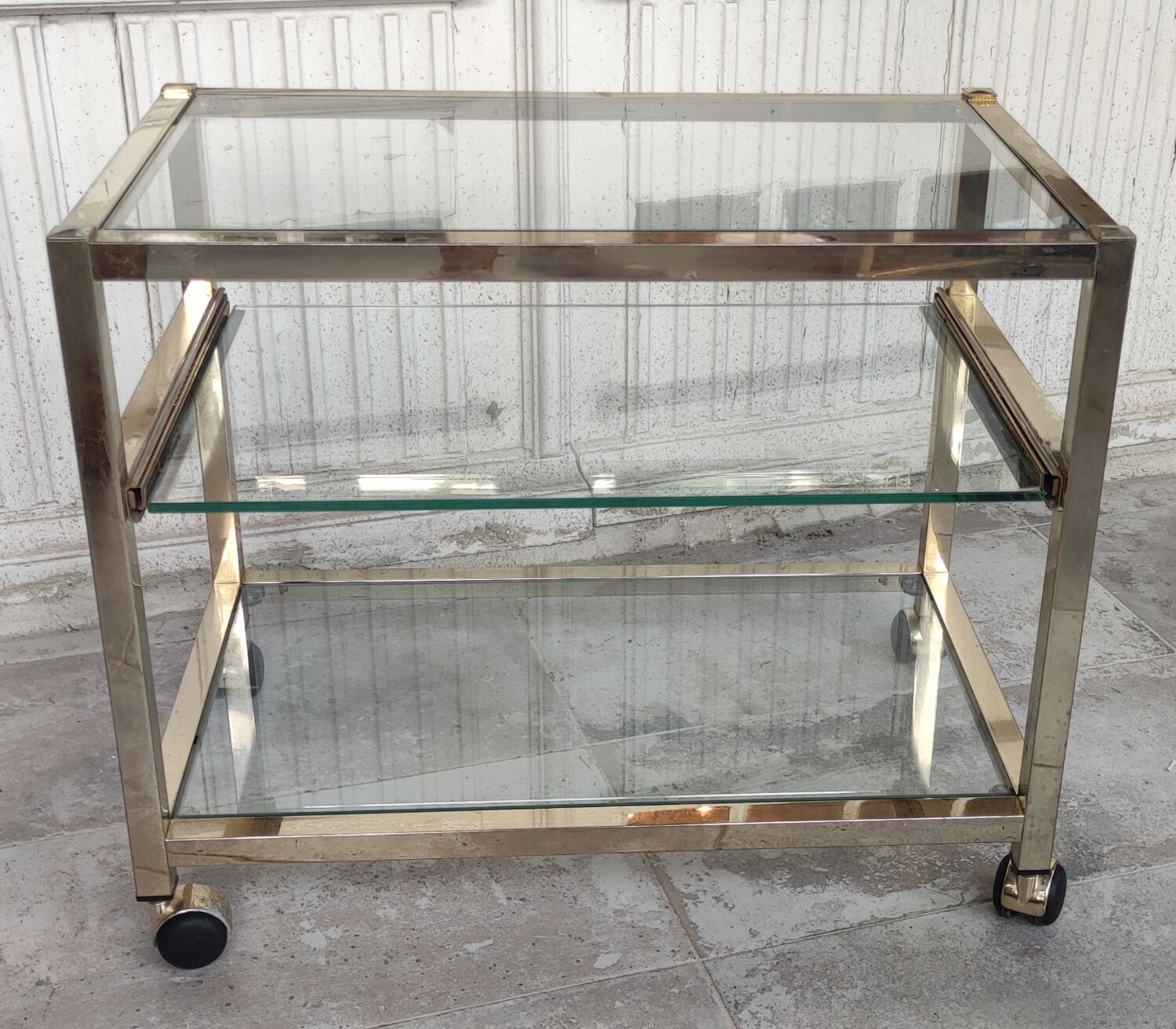 Rolling console service design / gold metal and glass