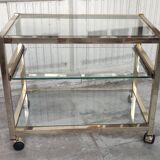 Rolling console service design / gold metal and glass