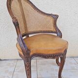 Fauteuil de bureau louis xv, sculpté, canné, garni cuir