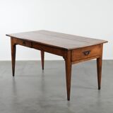 Elegant and subtle antique French dining table made of fruitwood