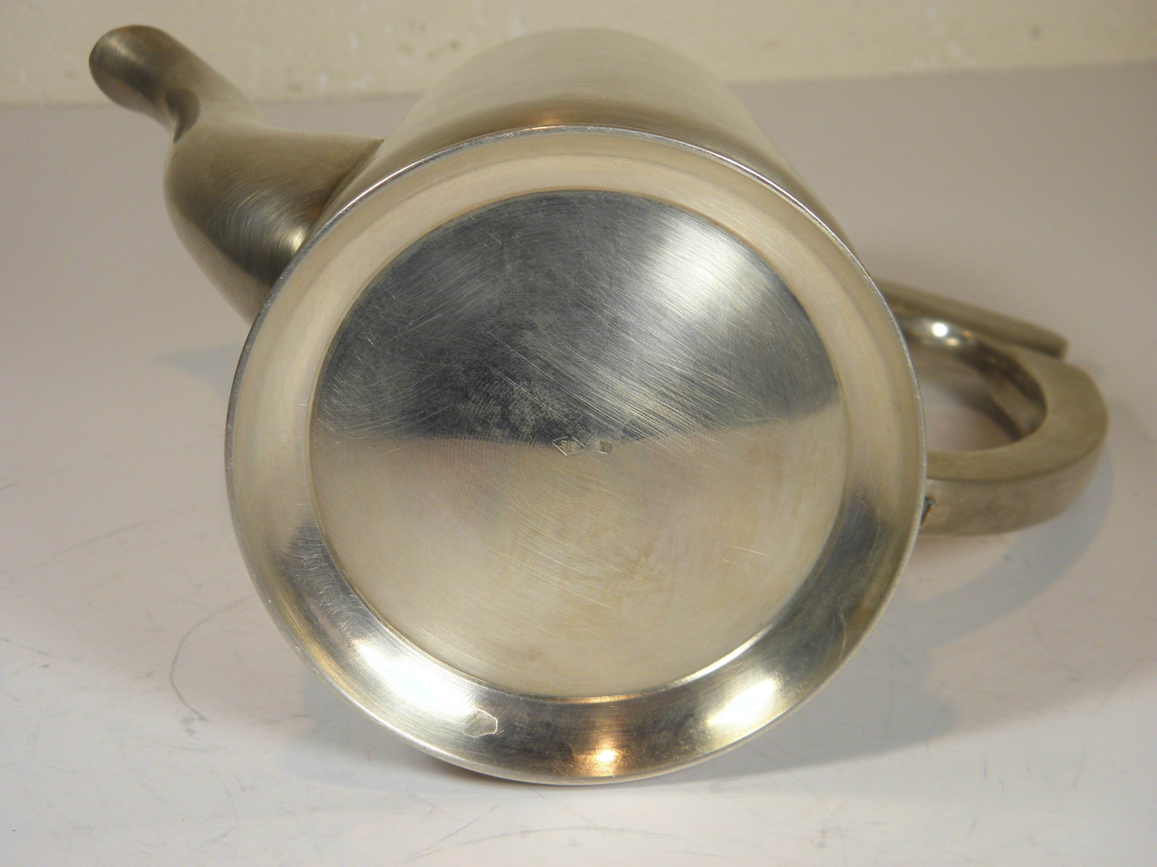 Silver-plated metal coffee pot and milk jug