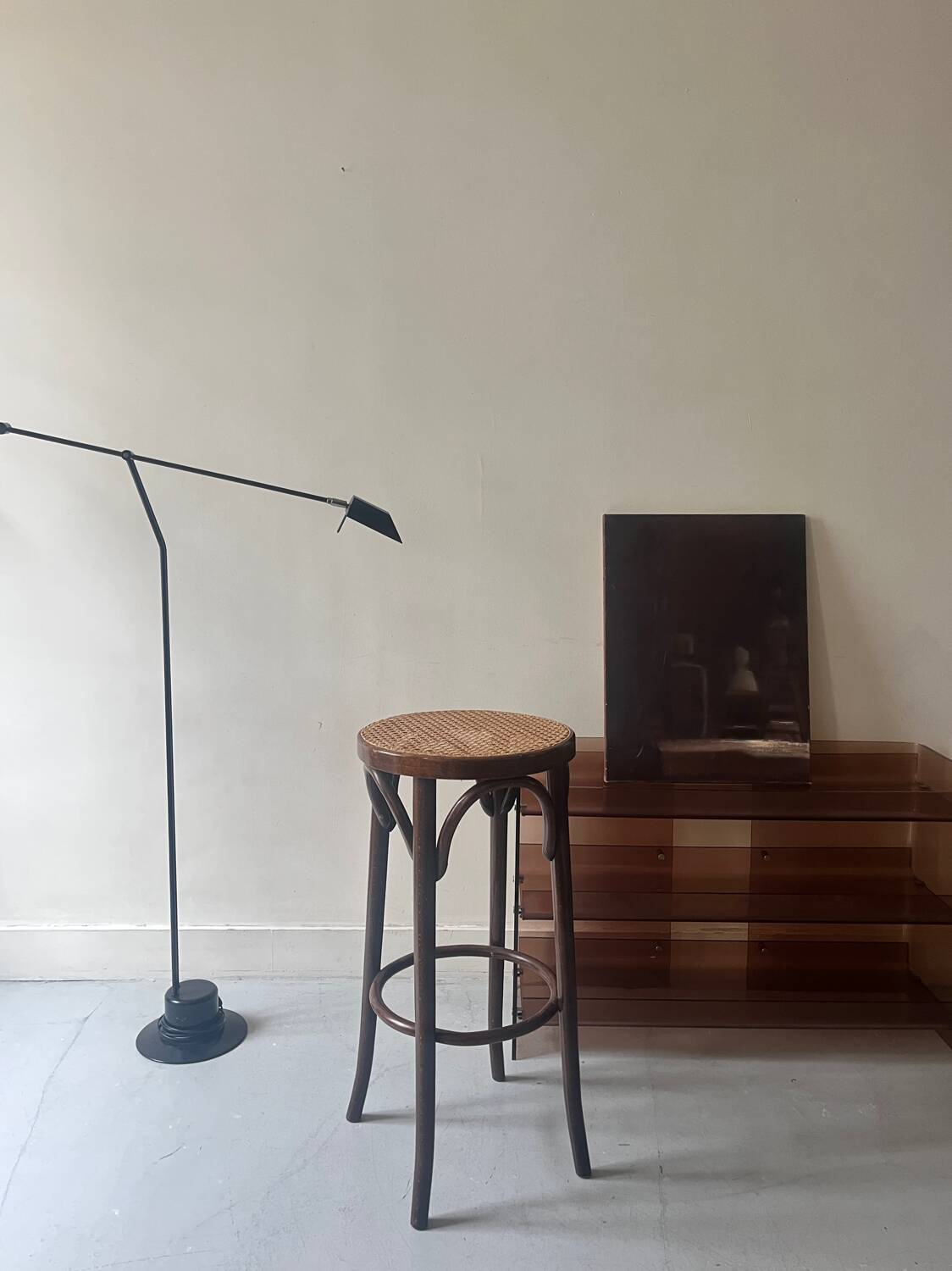 High bistro stool in turned wood and new cane, 1950
