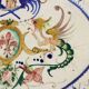 Ancient oval plate in majolica, Italy, late 19th century.