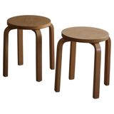 Alvar Aalto, a pair of vintage birch stools, model "60", made by Artek, 1970s.