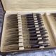 Antique dessert service 12 knives & 12 forks in brass and wood