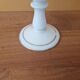Footed glass in the shape of a chalice in white opaline with a floral decoration.