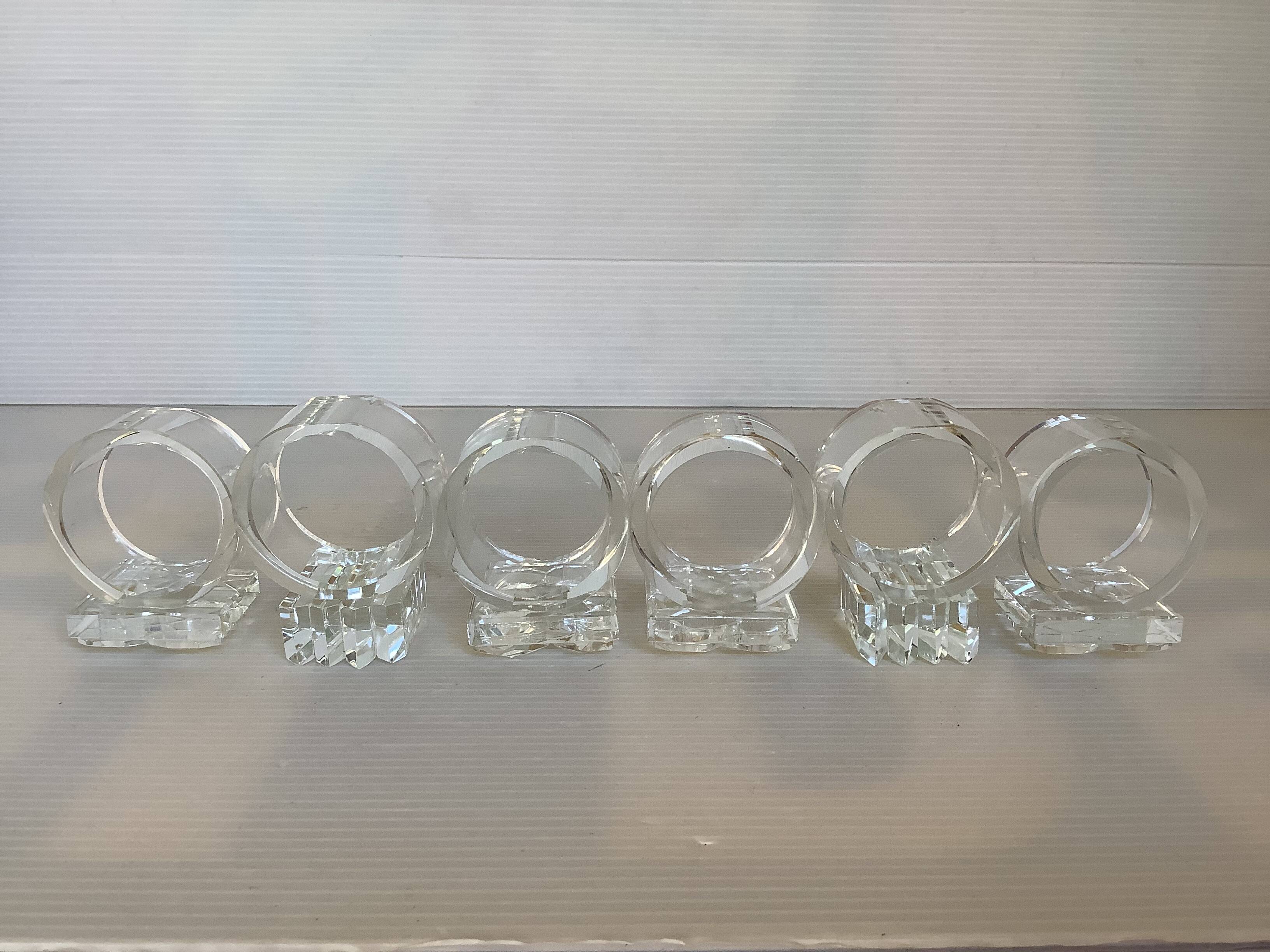 Six glass napkin rings
