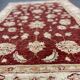 Tapis oriental en laine rouge motif floral,  fait main