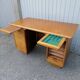 Old vintage wooden desk 1950 with curtain binder and storage tablet