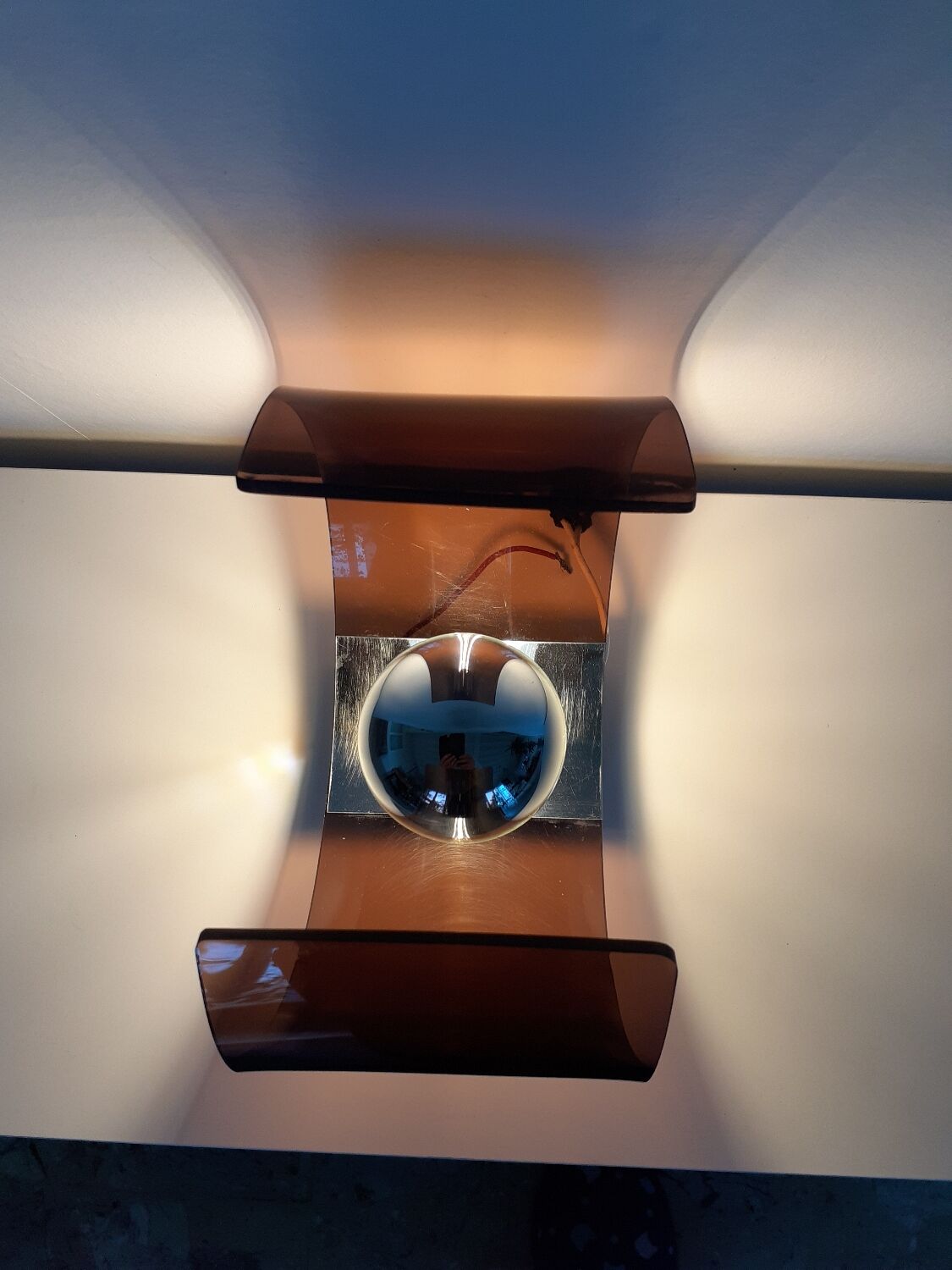 Space age plexiglass wall light.