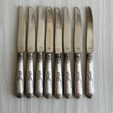 Set of 8 silver metal knives