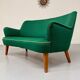 Old vintage green cocktail bean sofa from the 50s