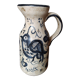 Ceramic pitcher signed Artesa bird motif
