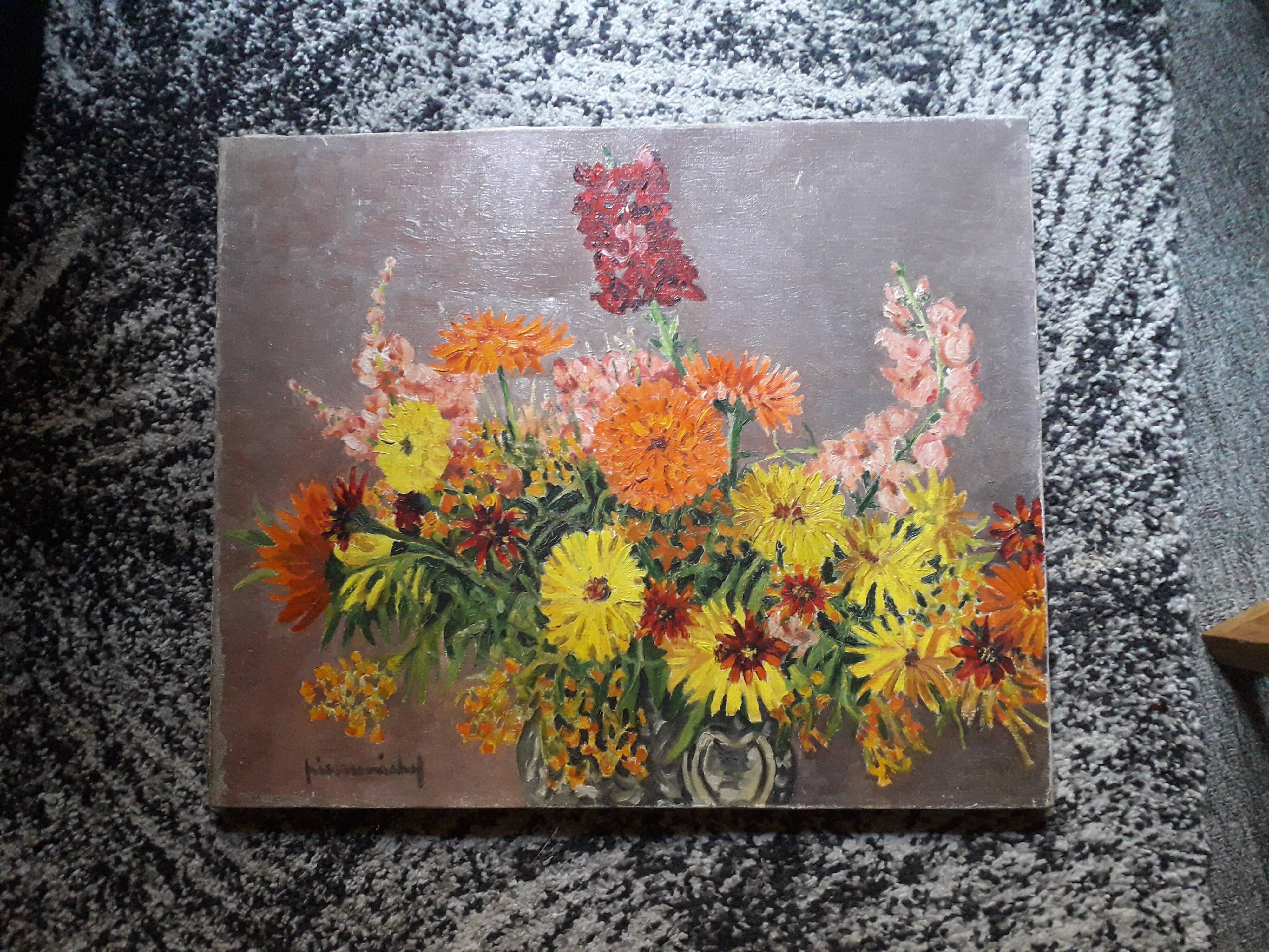 An old oil painting depicting a bouquet of flowers.