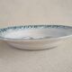 Serving dish iron earth decorated with child and stork decoration