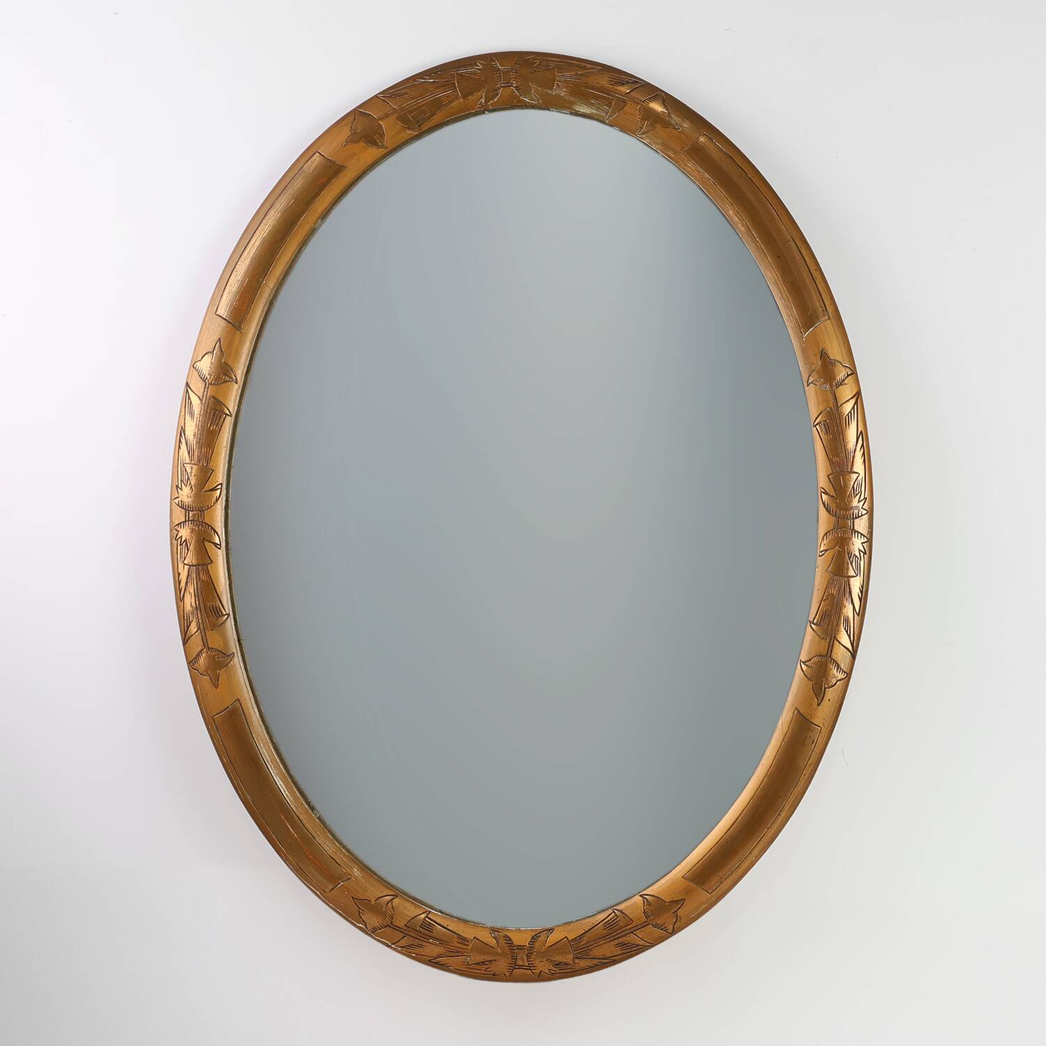 French Art Deco Oval gilded Mirror in Carved Wood, ca. 1920