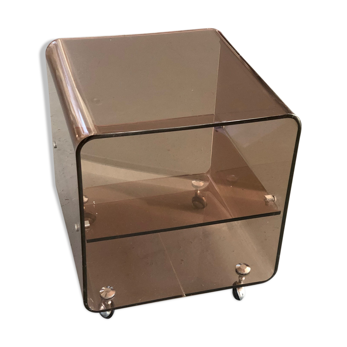 Served on wheels in smoked brown plexiglass 70s.