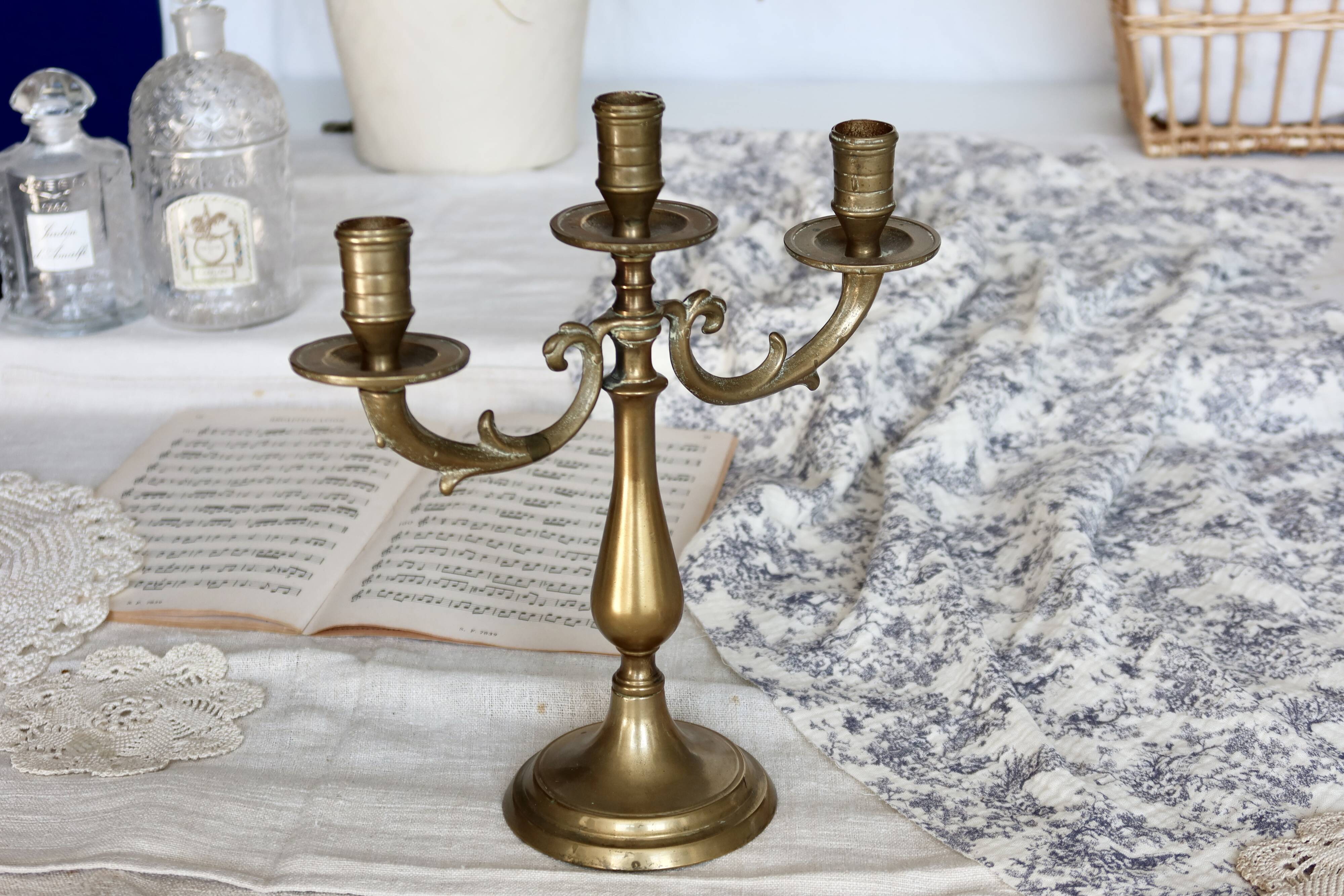 Antique 3-branch candelabra in patinated brass