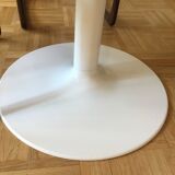 Dining table with a modular tulip foot