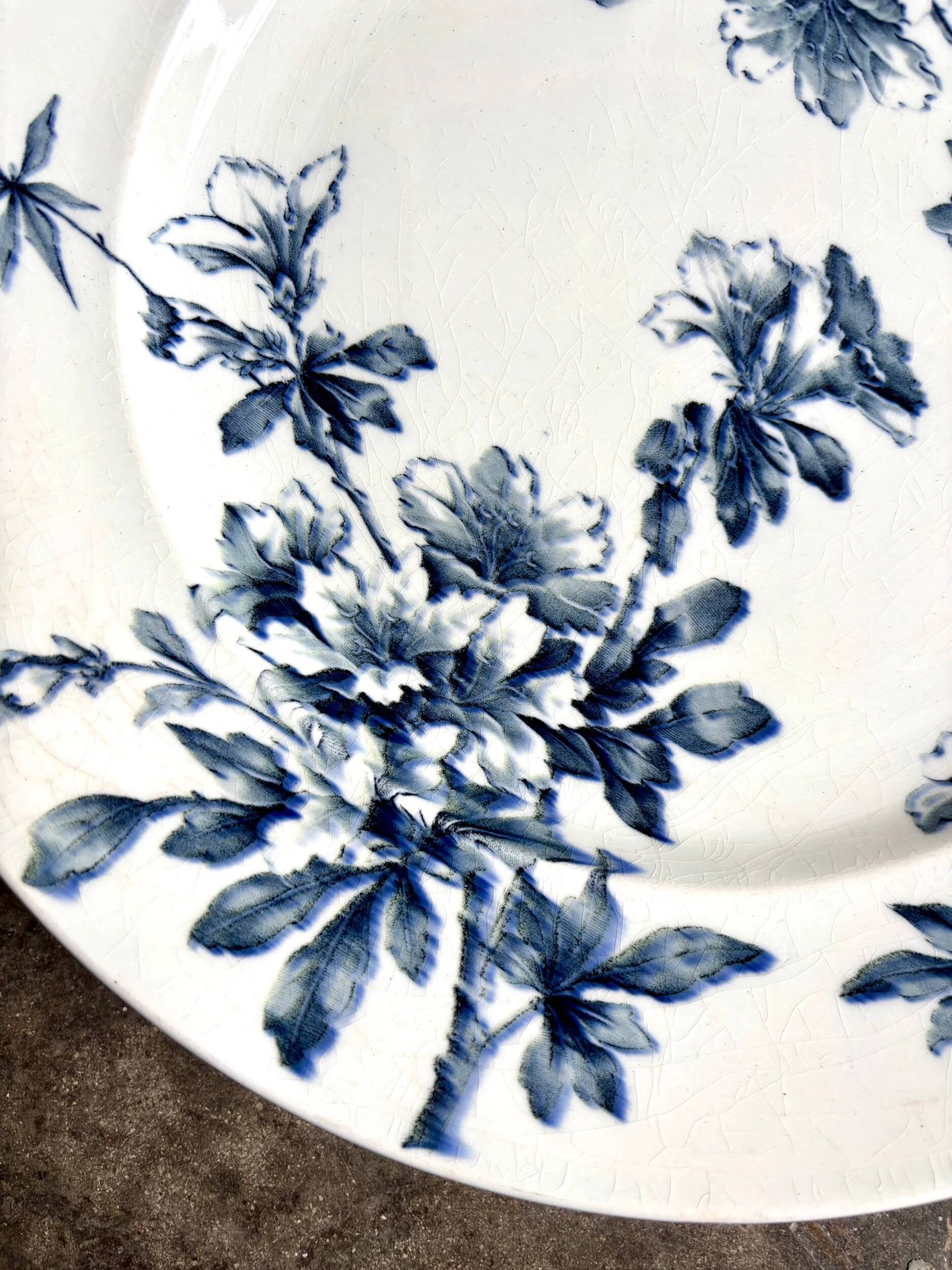 Large round Lunéville dish in blue ironstone, "Azaléa" service