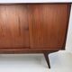 Vintage Danish teak wall unit with sliding doors from the 1960s.