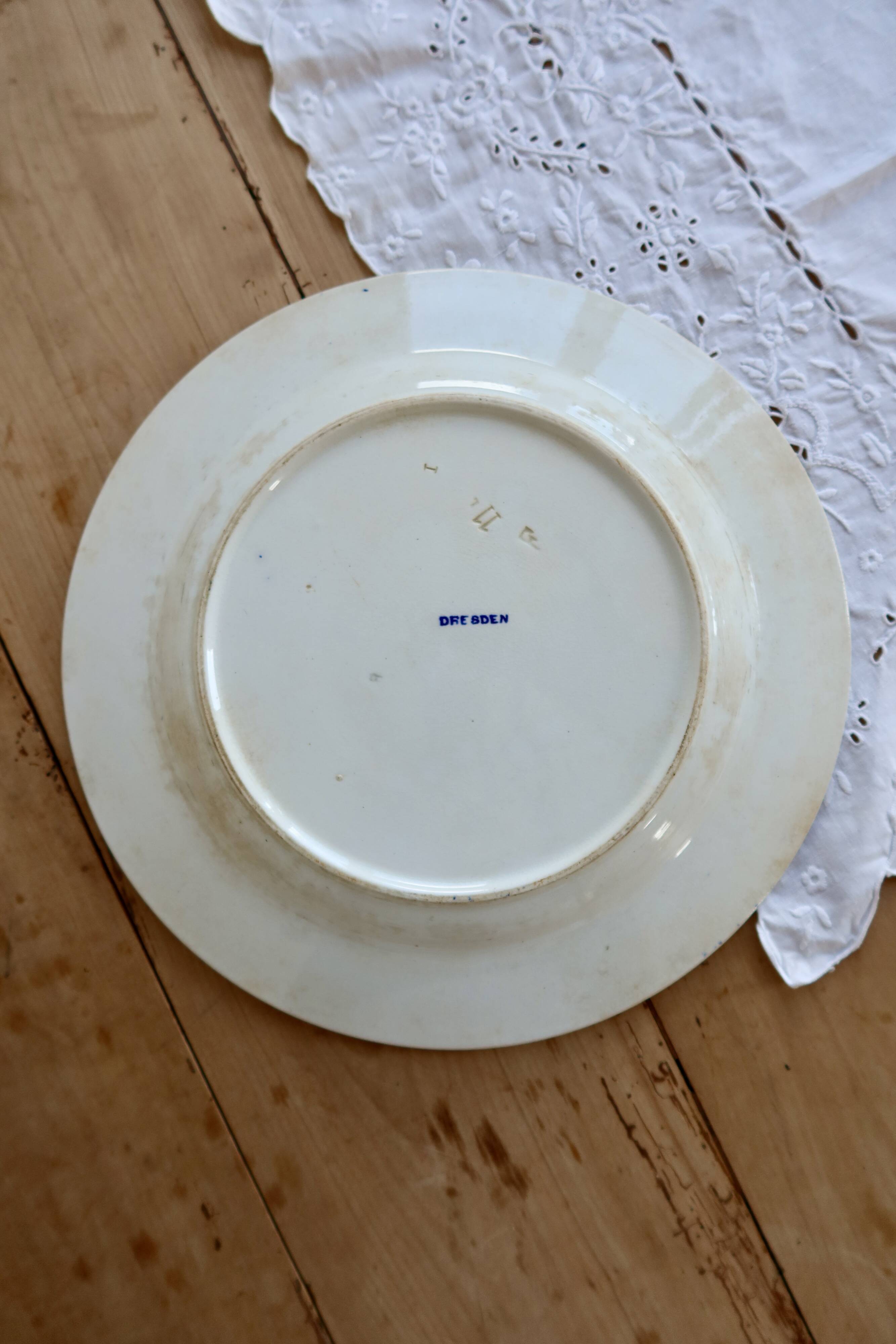 Large round antique plate, blue and white Dresden porcelain.