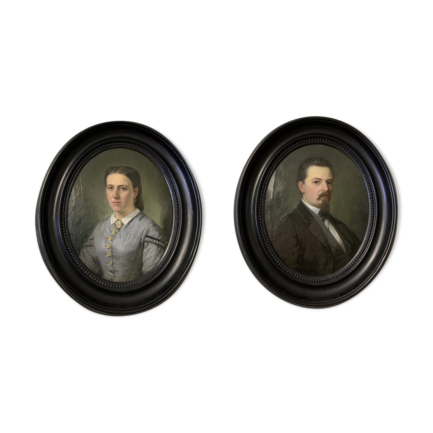 Pair of framed portraits