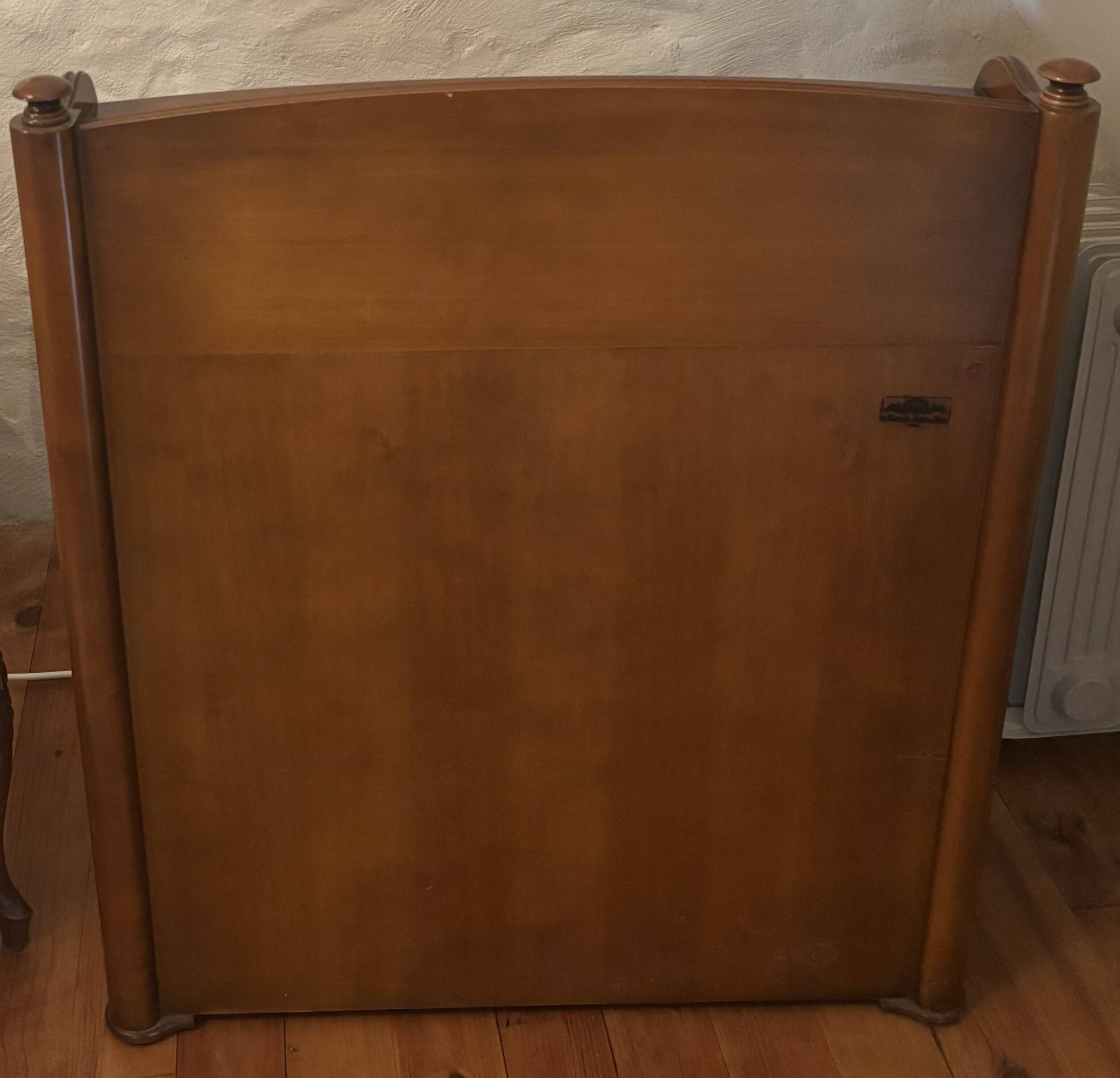 Vintage drop-leaf secretary with a green leather top and inlays.