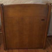 Vintage drop-leaf secretary with a green leather top and inlays.