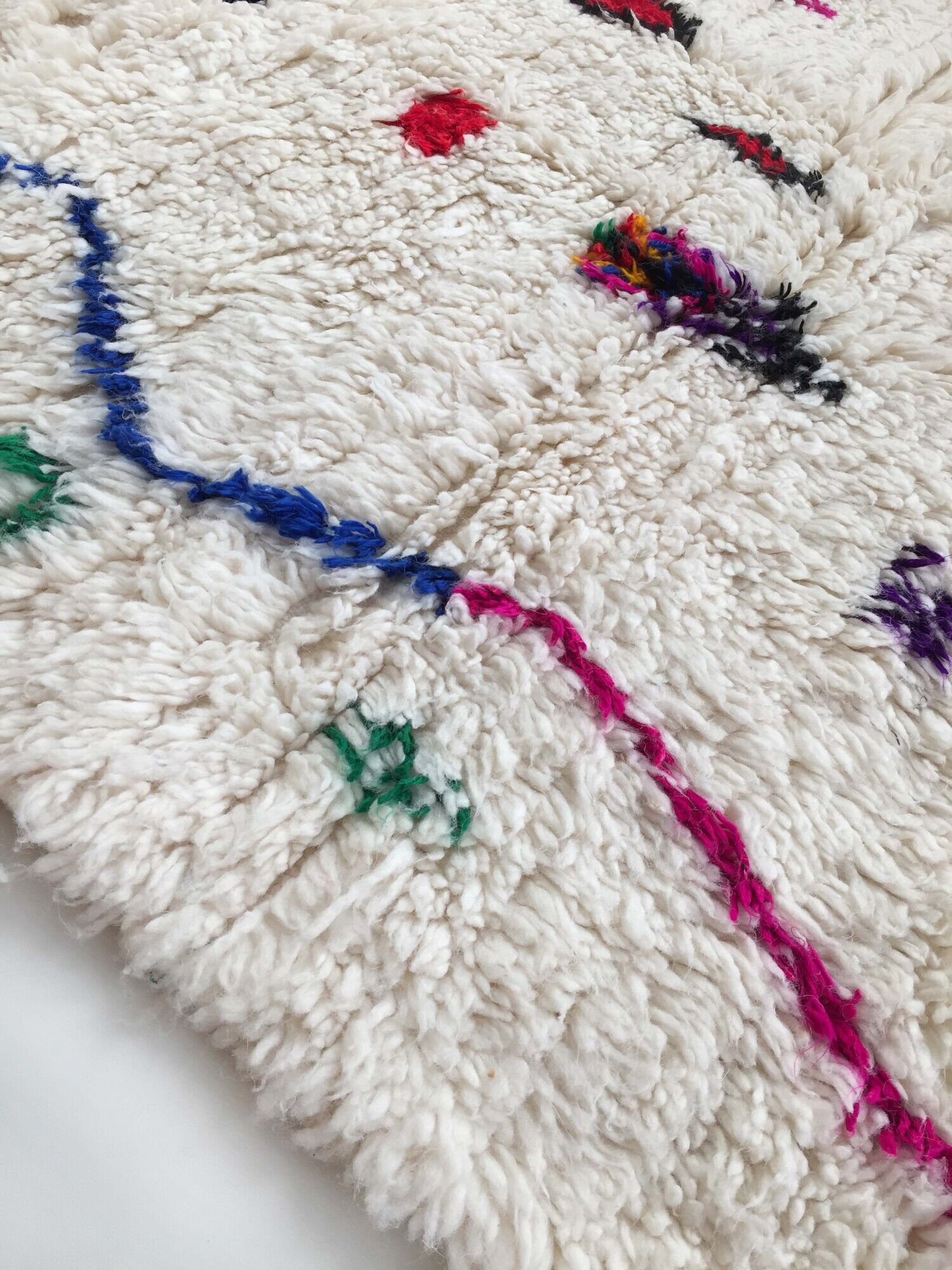 Moroccan Berber carpet Azilal unbleached with colored patterns 242x159cm