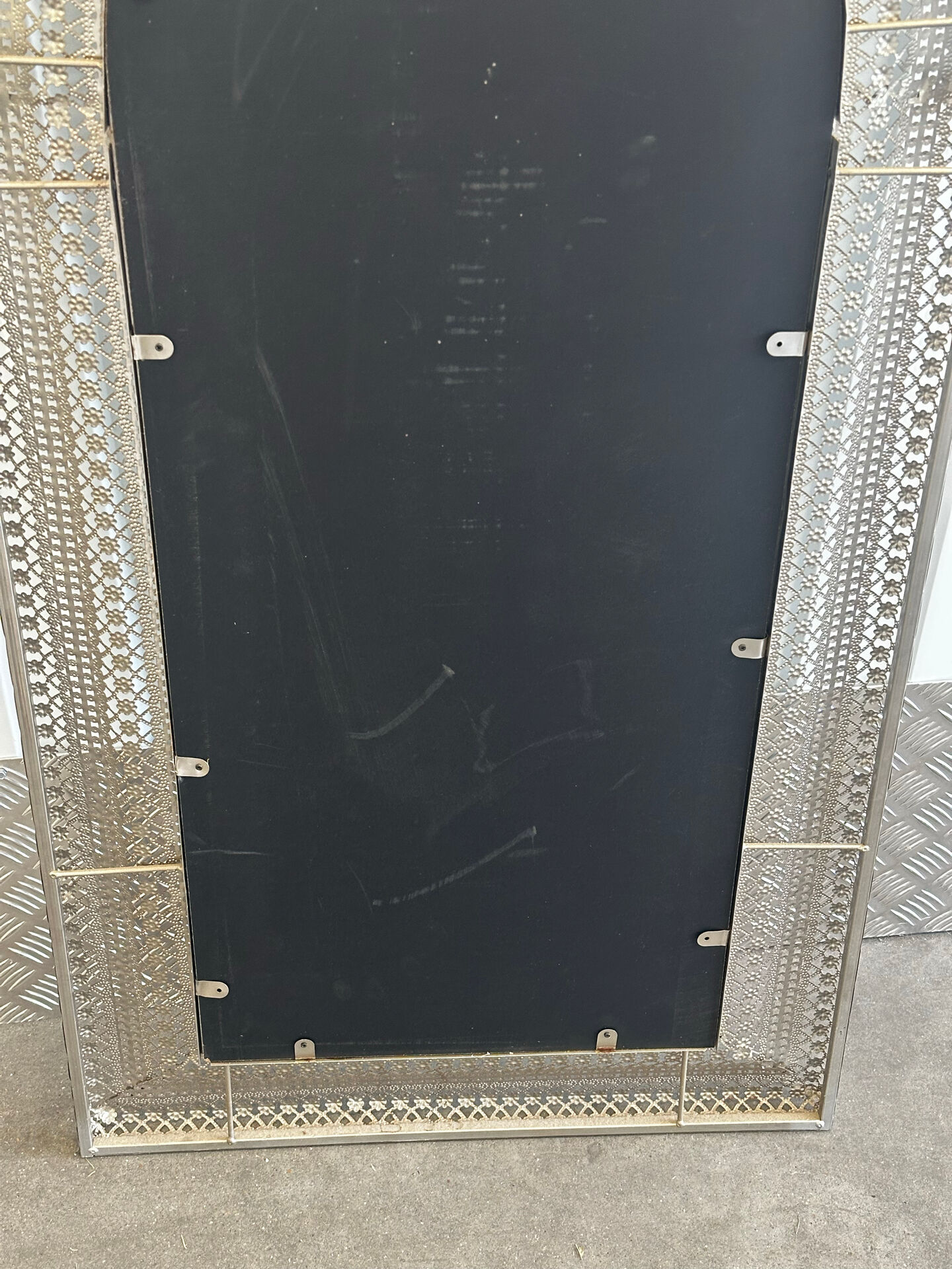 Large oriental mirror in pierced metal - H 116 cm