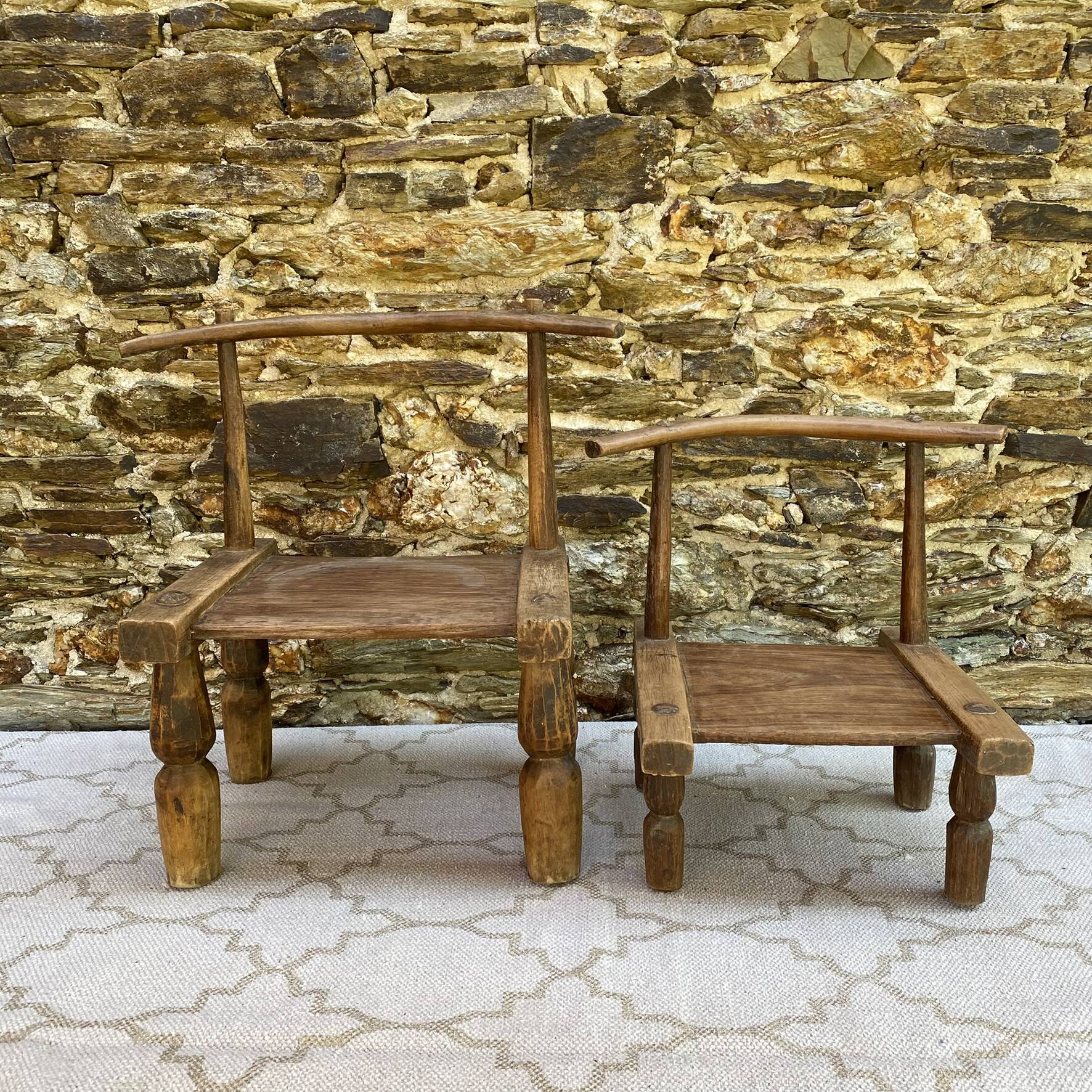 Ancient Baoulé African chairs in carved wood, Wabi-Sabi.