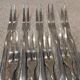 9 silver-plated snail forks by silversmith J Brille, 15.9 cm