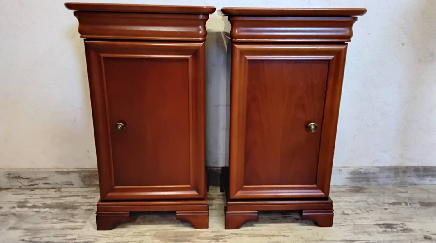Pair of Louis Philippe style bedside tables in cherry wood.