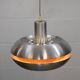 Old Danish space age design lamp in alu and orange inside.