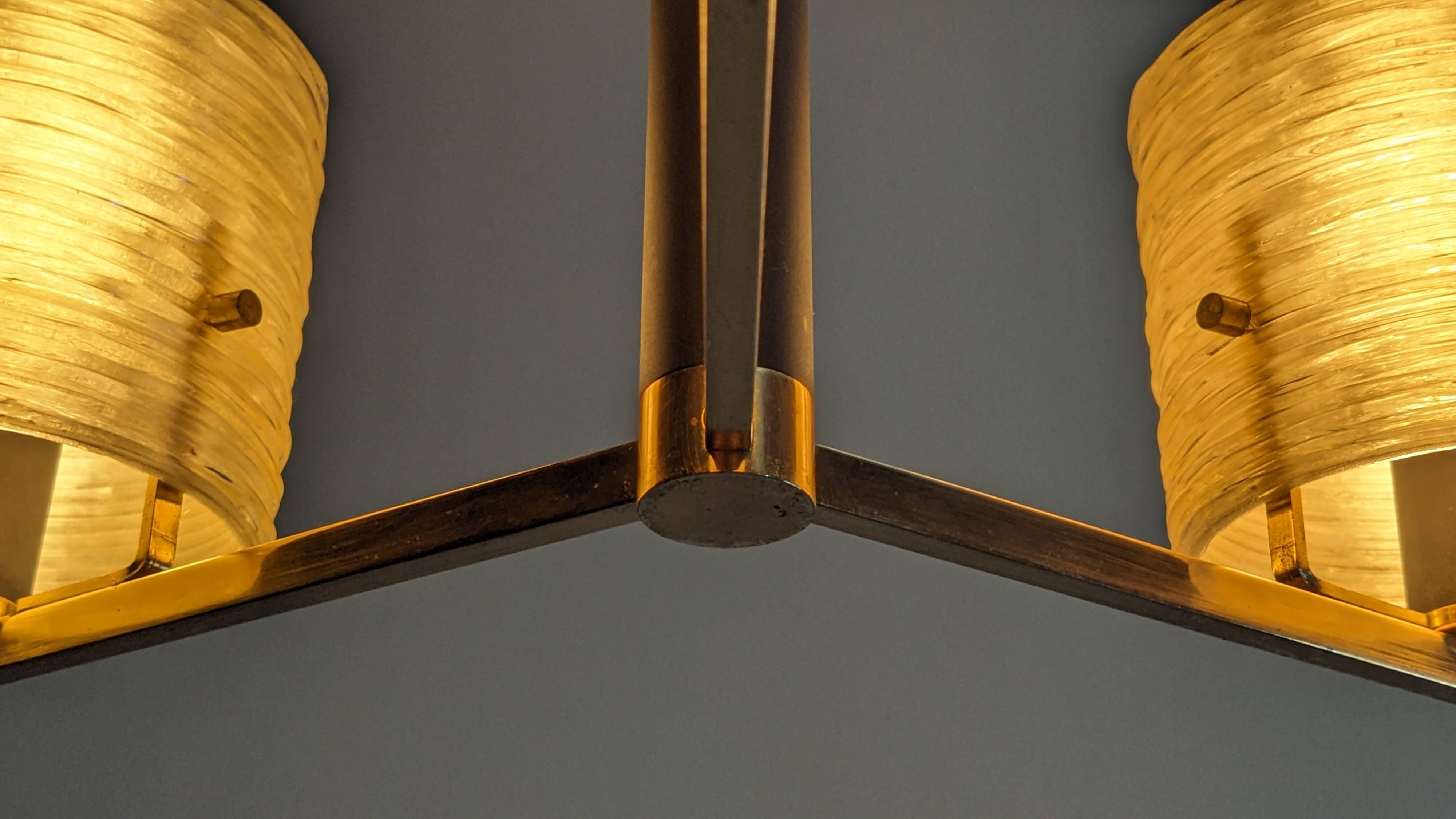 Three-light chandelier in mother-of-pearl and brass, Maison Arlus, France, circa 1950.
