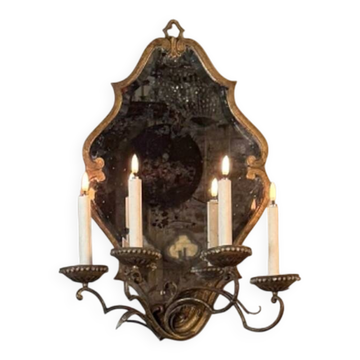 Gold metal wall mirror, in the style of Maison Baguès, Paris circa 1950.