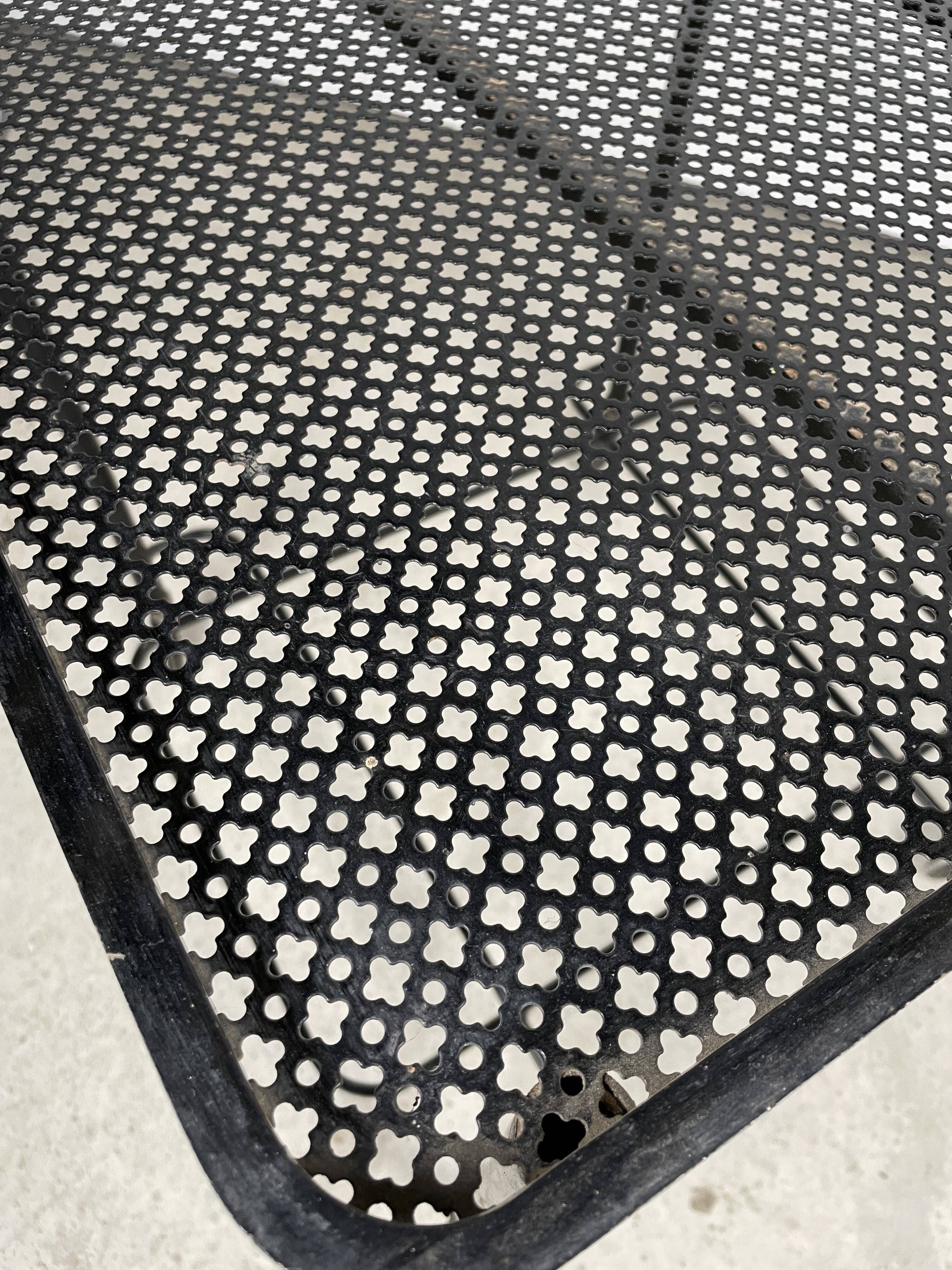 Trolley in perforated sheet metal