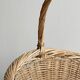 Large antique woven wicker basket with handle.