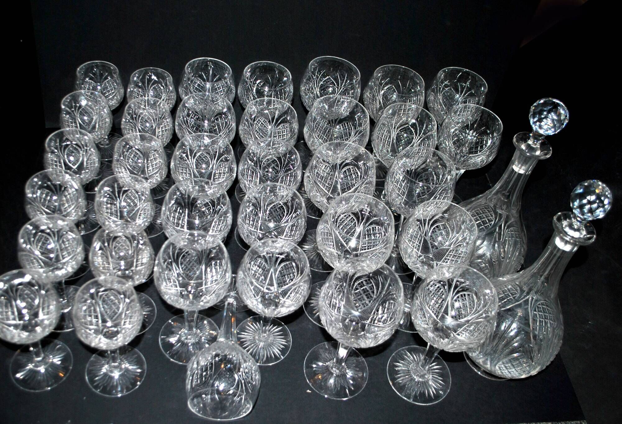 Baccarat set of 35 crystal glasses + 2 flower model carafes 9157 from 1907