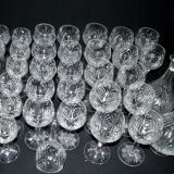 Baccarat set of 35 crystal glasses + 2 flower model carafes 9157 from 1907