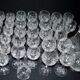 Baccarat set of 35 crystal glasses + 2 flower model carafes 9157 from 1907