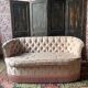 Small vintage 2-seater sofa from the 70s in Hollywood Regency style, satin pink.