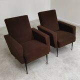 Pair of dark brown rockabilly style armchairs in new vintage condition