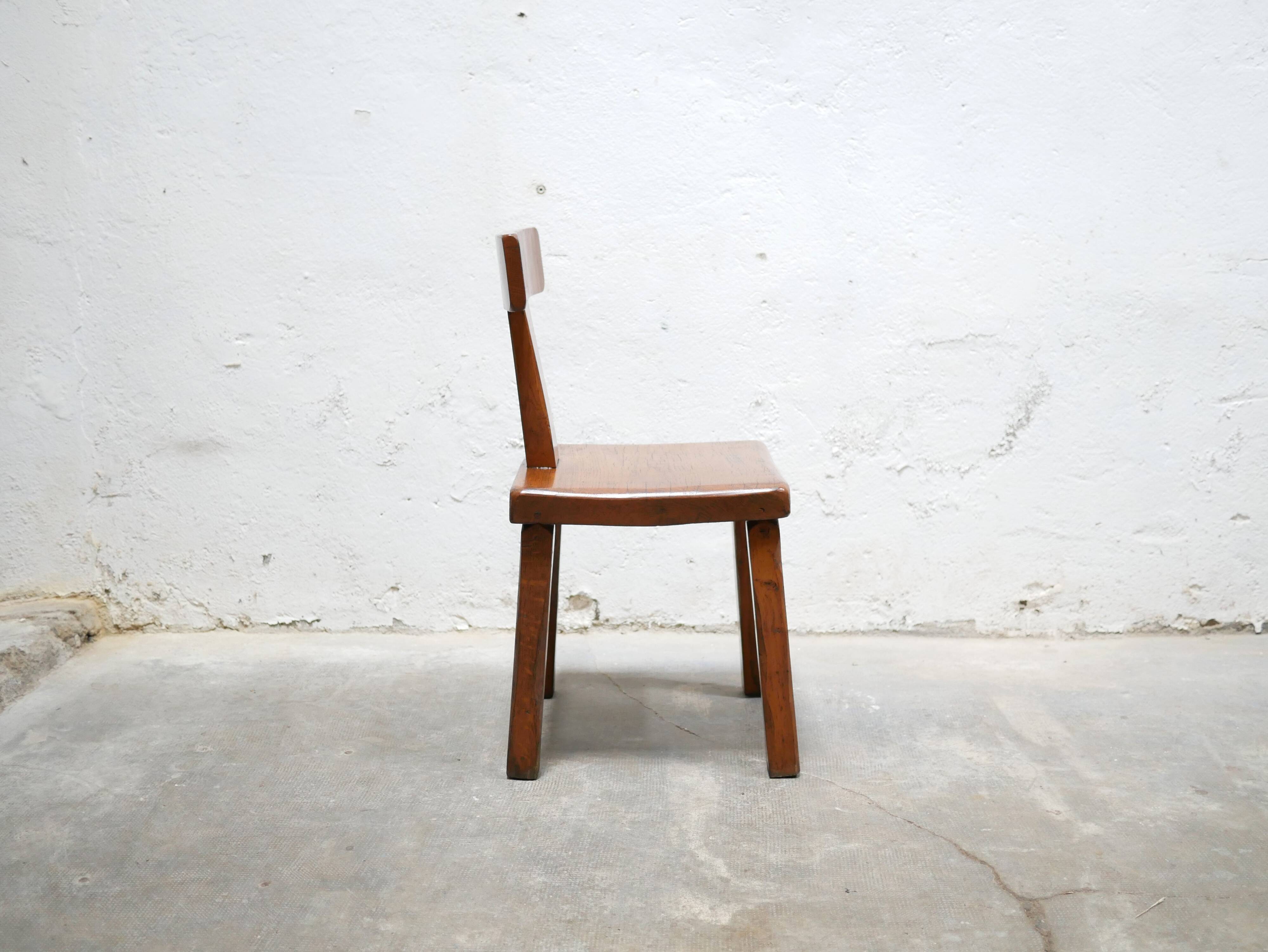 Vintage brutalist wooden T chair