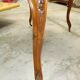 Curved desk in Louis XV style, made of carved and moulded walnut.