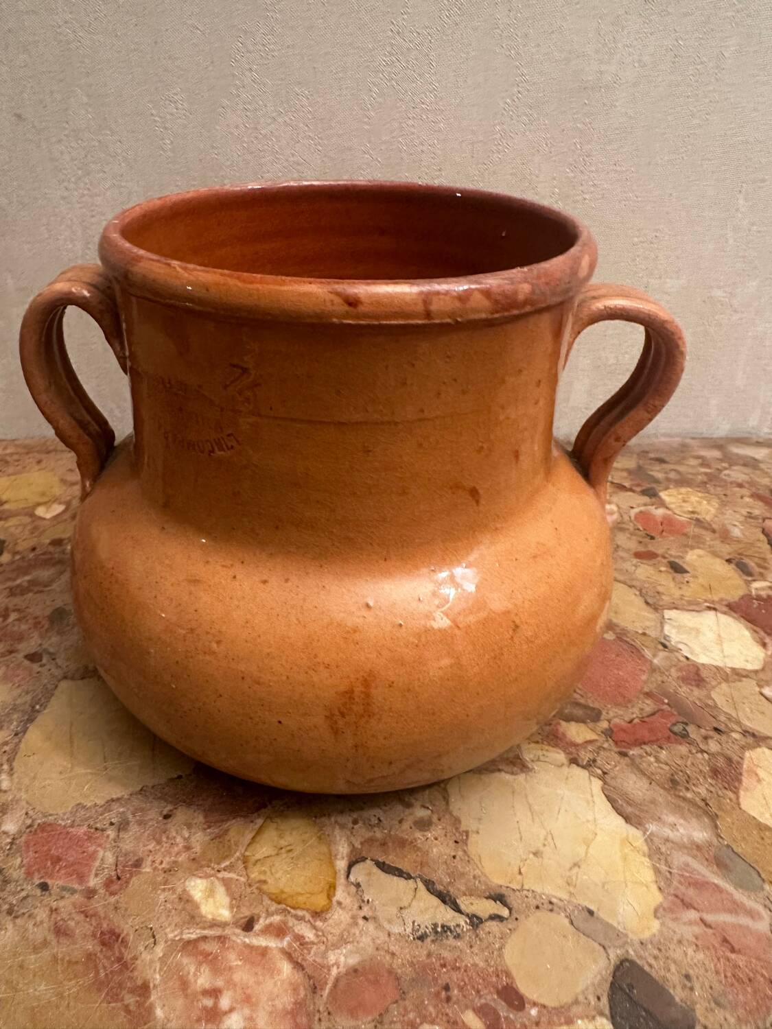 Old pot with handles in glazed Provençal pottery